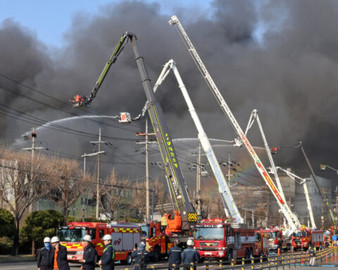 Officials say 14 were killed in fire at South Korean auto parts plant