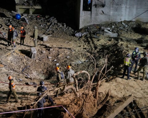 The Latest: Israel intensifying attacks, Iran shows defiance as its nuclear site hit