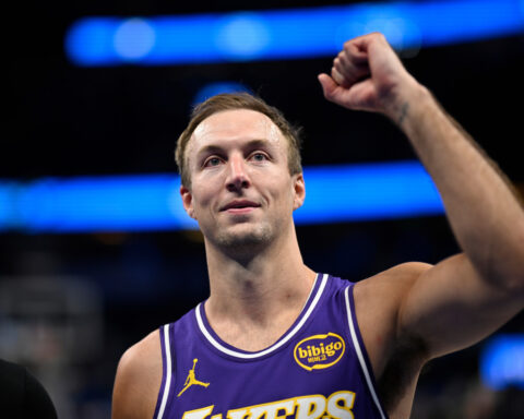 LeBron James breaks NBA mark for games played, Luke Kennard makes winning 3 in Lakers' win vs. Magic