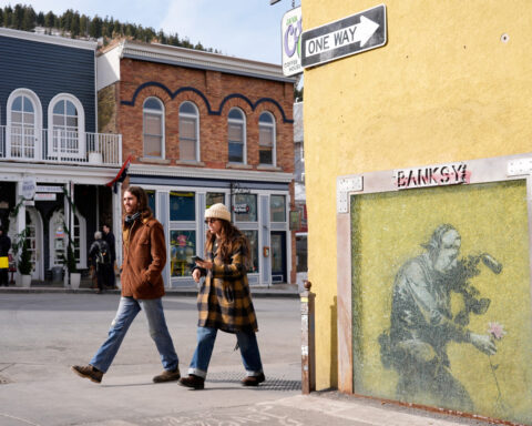 The media may have unmasked Banksy — again. That's angered some art fans but not ruffled dealers