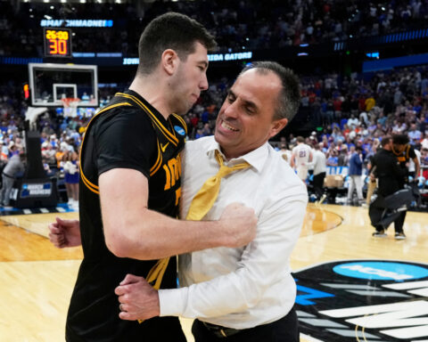 Iowa beats No. 1 seed and defending champ Florida in March Madness on Folgueiras' 3 in final seconds
