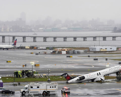 2 pilots killed when jet collides with fire truck at New York's LaGuardia Airport