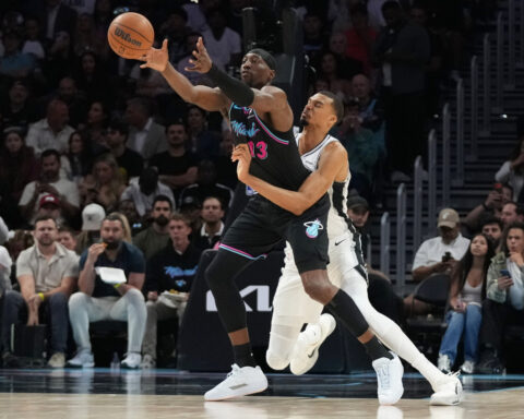 Wembanyama scores 26, red-hot Spurs roll past sliding Heat 136-111 and clinch Southwest Division