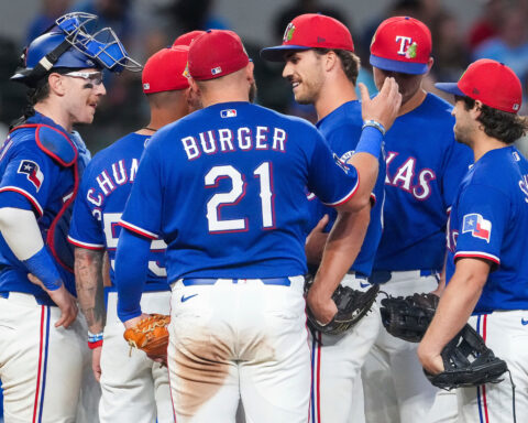 Rangers rookie pitcher finds out he made the team during a mound visit from manager