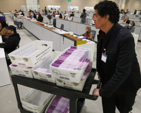 Trump casts Florida mail ballot as he pushes Congress to severely limit that voting option