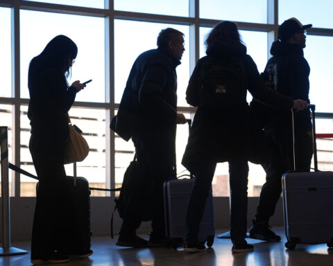 The Latest: Over 450 TSA officers have quit since the partial shutdown began
