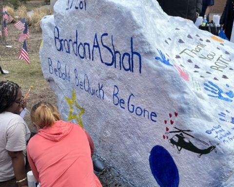 ODU students, ROTC cadets paint campus rock in Lt. Col. Brandon Shah's memory