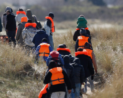 EU lawmakers vote to make it easier to set up migrant detention centers outside the bloc