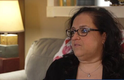 Woman raising awareness for kidney donations while waiting on her own