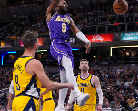 LeBron passes to Bronny for a 3-pointer and the NBA's first father-son assist, league says