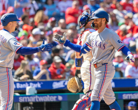 Gore wins 1st start, Nimmo and McCutchen hit 1st homers for Rangers in blowout of Phillies