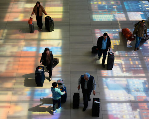 Airport bottlenecks ease as TSA workers get paid, but shutdown continues