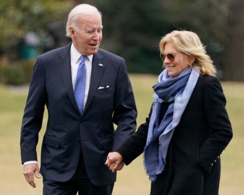 Joe and Jill Biden adopt a pair of black Lab-mix puppies named Boo and Scout