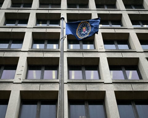 FBI agents who worked on Trump election probe sue, saying they were unjustly fired