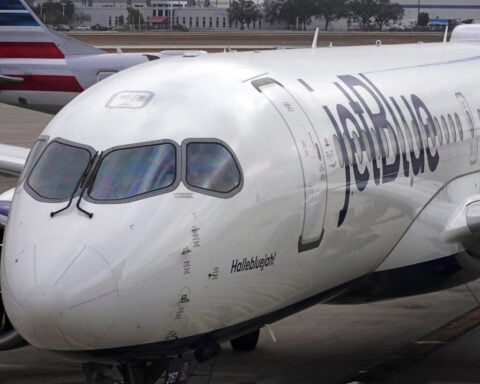 JetBlue raises its checked bag fees by as much as $9 as the Iran war affects fuel costs