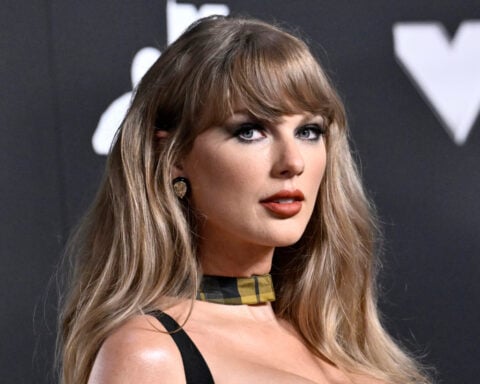 Lawsuit says Taylor Swift's 'Showgirl' pose comes too close to the work of a real one