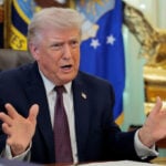 Trump signs executive order to crack down on mail-in voting