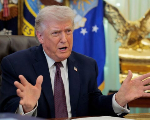 Trump signs executive order to crack down on mail-in voting