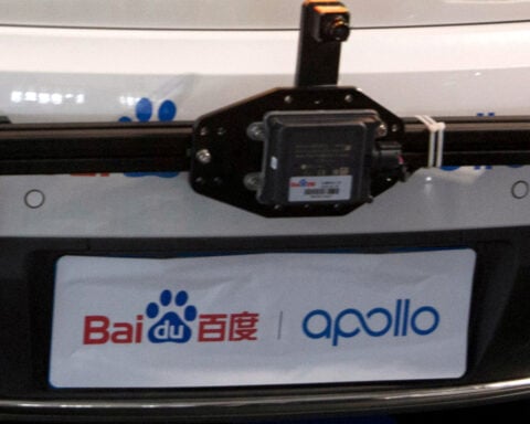 Passengers stranded in moving traffic after robotaxi outage in China's Wuhan