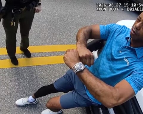 Bodycam shows a stunned Tiger Woods handcuffed after a Florida rollover crash