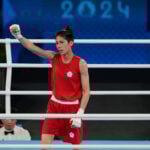 Olympic gold medalist boxer at center of gender controversy advances to Asian semifinals
