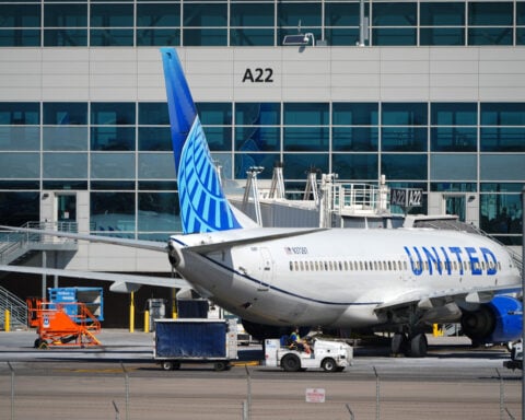 Checking a bag on United Airlines now costs $10 more as jet fuel costs soar