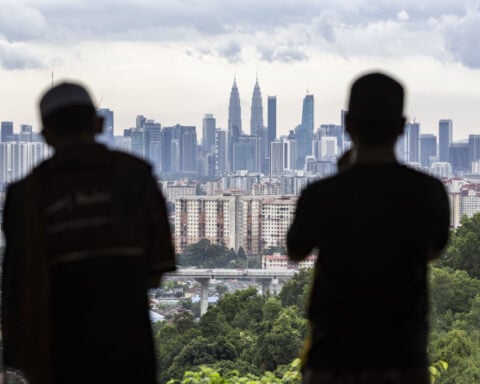 As Taiwan steels its defenses against China, some are hatching escape plans