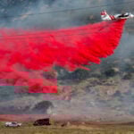 Crews battle fast-growing wildfire in windy Southern California that's forced some to evacuate