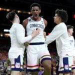 UConn reaches 3rd national title game in 4 seasons, beating Illinois 71-62 behind Mullins and Reed