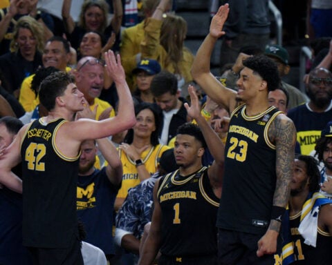 Michigan star Yaxel Lendeborg turns left ankle and injures knee in Wolverines' Final Four win