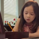 6-year-old girl holding art auctions to raise money childhood cancer patients