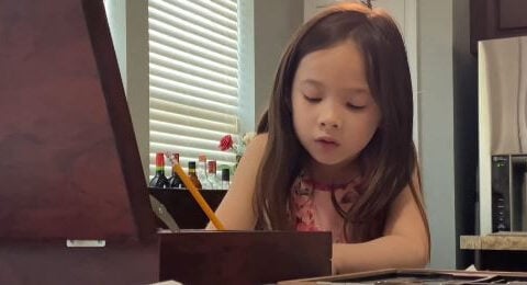 6-year-old girl holding art auctions to raise money childhood cancer patients