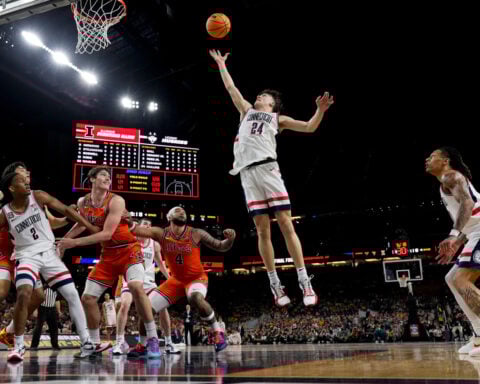 Mullins family shifts longtime allegiance from Michigan to UConn for national championship game