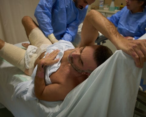 The Latest: Trump threatens to strike Iran's infrastructure if Strait of Hormuz isn't reopened