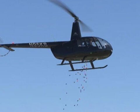 Helicopter drops thousands of Easter eggs for egg hunt at Colorado church