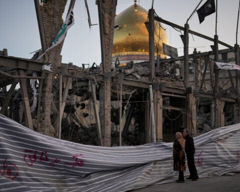 The Latest: Trump threatens to strike Iran's infrastructure if Strait of Hormuz isn't reopened