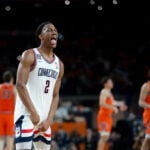 In NCAA title game, a Michigan team on a roll tries to derail a UConn dynasty