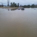 Flooding strands drivers and prompts more than a dozen rescues over the holiday weekend