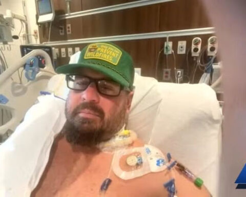 Firefighter, whose heart stopped several times, shares miraculous survival story from hospital bed