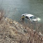 Woman cuts through airbag, escapes sinking car with her toddler after crash into river