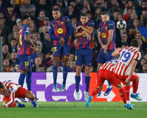 Atletico wins 2-0 at 10-man Barcelona in 1st leg of Champions League quarterfinal