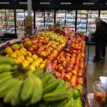 US economy grew a sluggish 0.5% in fourth quarter, government says, downgrading previous estimate