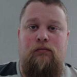 Couple, ex-police officials tied to prostitution scheme, intel-gathering effort, district attorney says