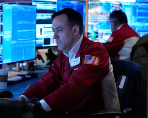 US stocks swing higher and oil prices trim their gains on hopes for the ceasefire with Iran