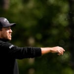 Schauffele's drive appears to land in a viewer's merchandise bag. It didn't stop him from making par