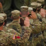 Automatic military draft registration takes effect in December. Here’s how it would work