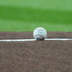Tigers' Parker Meadows leaves game on a cart after a head-to-head collision with teammate Greene