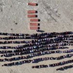 A Syrian man buries his wife and 4 children killed in Israeli strikes on Beirut