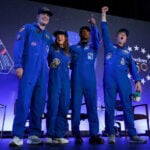 Artemis II's moon-traveling astronauts return home to cheers after a record-breaking trip