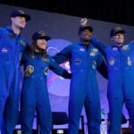Artemis II's moon-traveling astronauts return home to cheers after a record-breaking trip